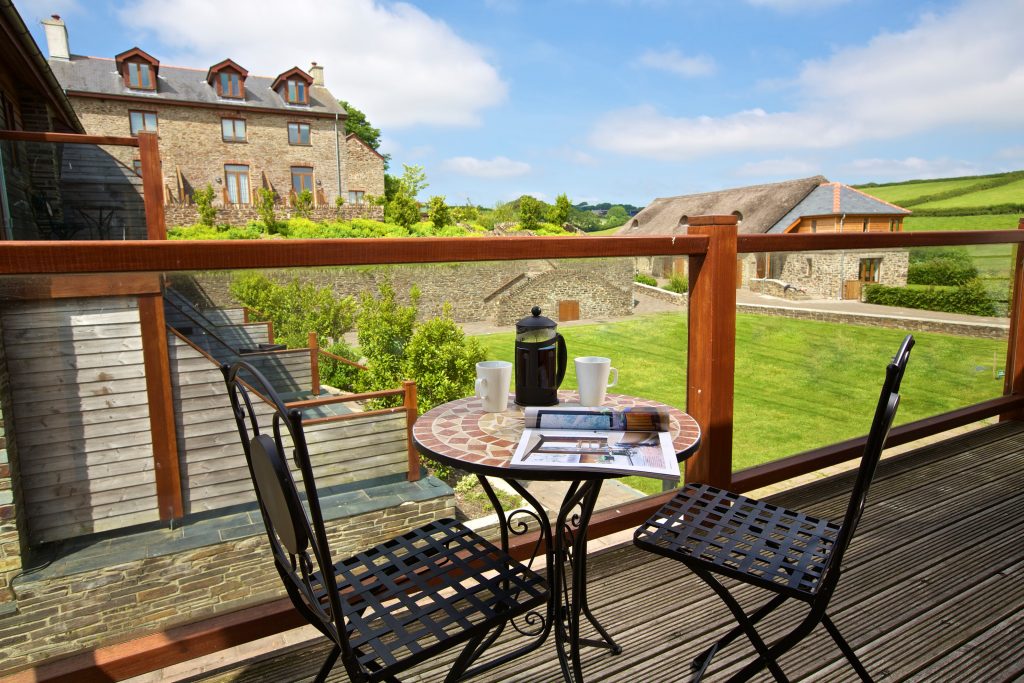 Image of balcony overlooking the hotel grounds